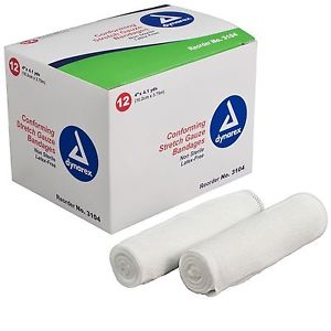 Box of Dynarex 3104 4" non sterile gauze rolls with 2 loose rolls