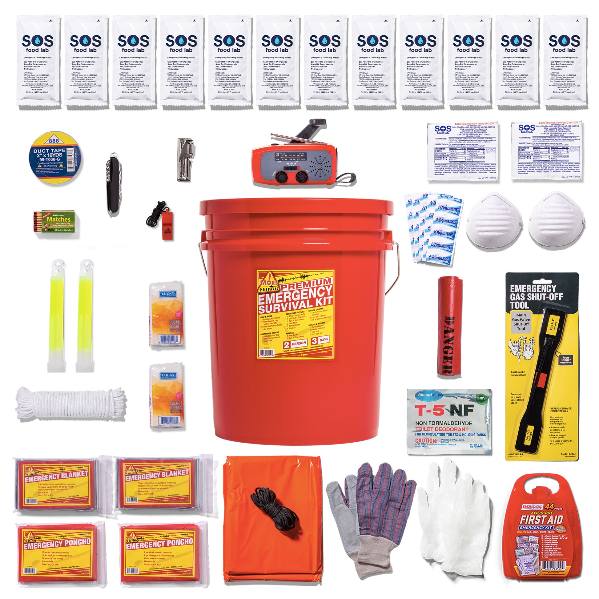 A comprehensive emergency survival kit laid out in a grid pattern around a large red plastic bucket. The kit contains various survival, first aid, and safety items including food bars, water pouches, a red emergency radio, a T-5 packet, face mask, white gloves, work gloves, emergency blankets, and other survival gear on a clean white background.