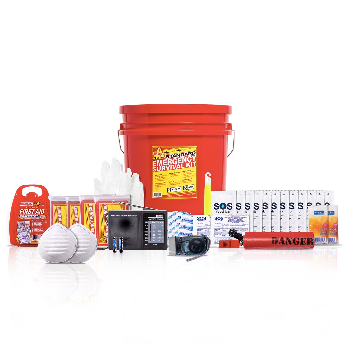 A survival emergency kit bundle arranged on a white background, including a large red bucket labeled emergency survival kit, first aid items, bottled water, a radio, masks, batteries, flashlights, and other survival supplies.