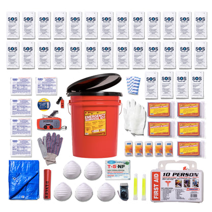 A comprehensive emergency survival kit arranged on a white background, featuring a red bucket with a black lid, multiple white SOS water pouches, gloves, face masks, a blue tarp, a first aid kit, and other survival supplies.