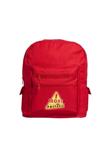 A red backpack with a front zippered pocket featuring a yellow and red 'More Prepared!' logo patch, shown against a plain white background.